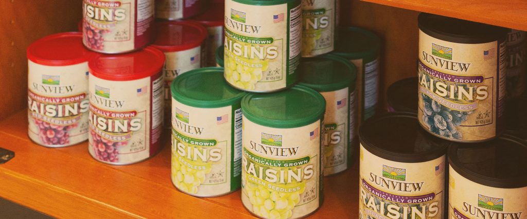 Canisters of Sunview Organic Raisins